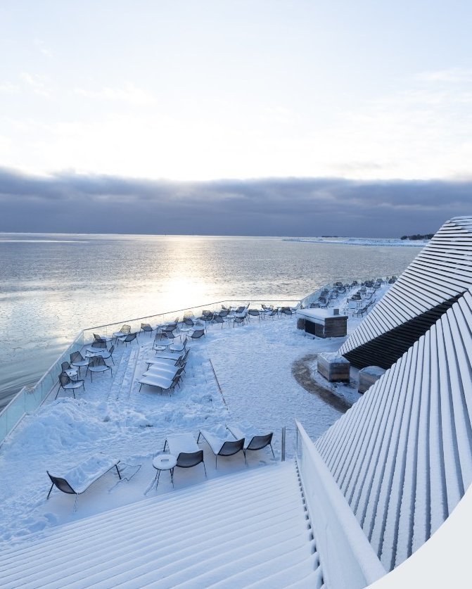 Löyly's snowy terrace above the Baltic